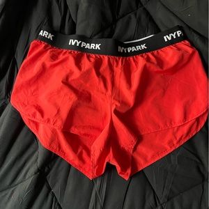 Ivy park taped red running shorts size m